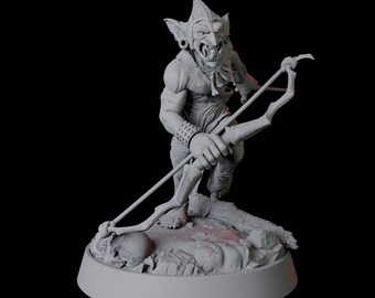 May include: A gray figurine of a goblin archer, poised with a bow and arrow. The goblin has a fierce expression, pointed ears, and is adorned with jewelry. The figurine is on a base with a skull and a textured surface.