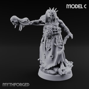 May include: A grey miniature figure labeled MODEL C and MYTHFORGED, depicting a humanoid warrior with a spiked crown, holding a skull on a staff. The figure wears a strapped chest piece, a long tattered robe, and stands on a rocky base.