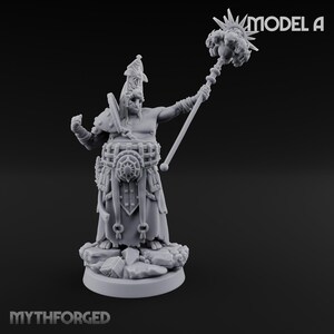 May include: A gray unpainted miniature figure labeled MODEL A and MYTHFORGED, depicting a humanoid character wearing a tall headdress and armor, holding a spiked mace aloft while standing on a rocky base with rubble and debris at the feet.