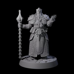 May include: A gray, 3D-printed miniature of a fantasy character, possibly a wizard or cleric. The figure is clad in detailed armor and holds a staff. The miniature is standing on a circular base, ready for tabletop gaming or display.