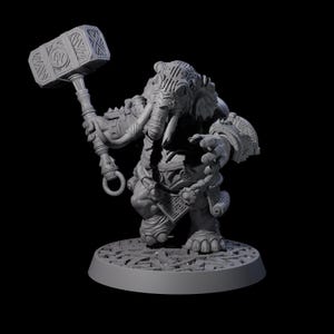 May include: A grey figurine of an elephant-like creature wielding a large hammer. The figurine has detailed armour and stands on a circular base. The hammer has a square head with carved designs.