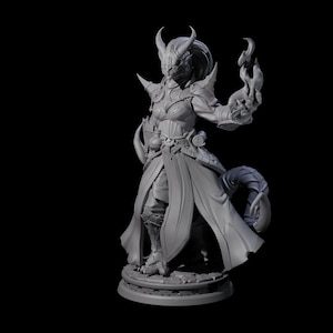 May include: A gray fantasy figurine of a female warrior with horns, armor, and a flowing cloak. The figure is holding a flame in one hand and has a tail. The figurine is standing on a detailed circular base.