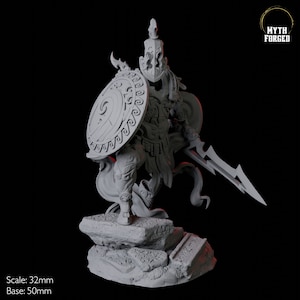 May include: A gray warrior figurine with a shield and sword, standing on a rocky base. The shield has a circular design. The figurine is 32mm tall with a 50mm base. The text "Myth Forged" is in the upper right corner.