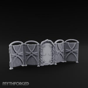 May include: A gray, fantasy-themed miniature terrain set. The set includes four connected wooden fence panels with an arched doorway in the center. The panels have a rustic design with vertical planks and crisscross accents. The text "MYTHFORGED" is at the bottom.