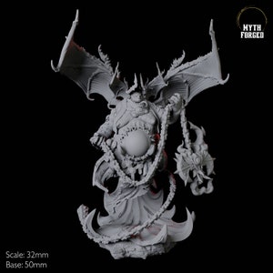 May include: A detailed gray miniature figure of a demonic character with large bat-like wings, horns, and a chain. The figure has a large belly and is holding a lantern-like object. The base is 50mm.