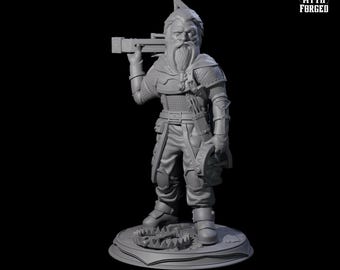 以下が含まれることがあります： ひげを生やしたドワーフの戦士のグレーのミニチュアで、スケールは32mmです。鎖帷子を着用し、クロスボウを持っています。ミニチュアは、25mmのベースに立っており、トラップがあります。