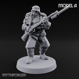 May include: A gray miniature soldier figure labeled MODEL A, wearing a helmet and gas mask with a hose, holding a rifle with a bayonet. A small creature figure hangs from the belt. The base is circular and the text MYTHFORGED is visible.