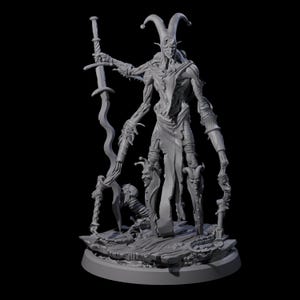 May include: A gray 3D-printed figurine of a tall, slender figure with a jester's hat, holding a sword. The figure has multiple arms and is surrounded by other grotesque figures. The base is a circular platform.