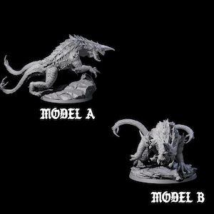 May include: Two detailed, grey dragon models, labelled Model A and Model B, are shown against a black background. Model A is in a dynamic pose, while Model B is crouched. The models are likely for tabletop gaming or collecting.