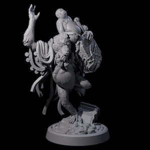 May include: A gray figurine depicting a fantastical creature with a monkey-like face and body, holding a shield. Another figure sits on its back. The sculpture is on a round base, with intricate details and a dynamic pose.