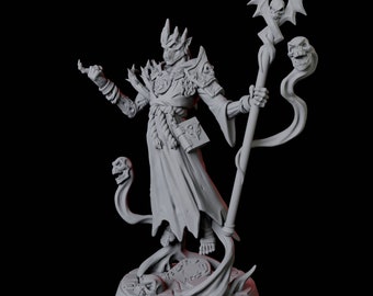May include: A gray painted miniature figurine of a skeletal wizard with a staff and a skull on top. The wizard is wearing a robe and has a book in one hand. The base of the figurine is decorated with skulls and vines.