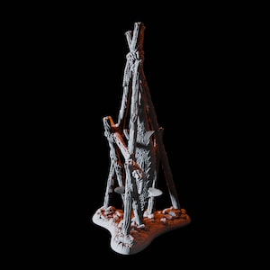 May include: A white, 3D printed model of a fish hanging from a wooden tripod. The fish is suspended by a rope and is positioned in a vertical orientation. The tripod is made of three wooden poles that are connected at the top and bottom. The model is set against a black background.