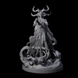 May include: A gray sculpture of a horned figure in a flowing gown, holding a sword. The figure stands on a base surrounded by stylized waves and creatures. The sculpture has a detailed, textured appearance.