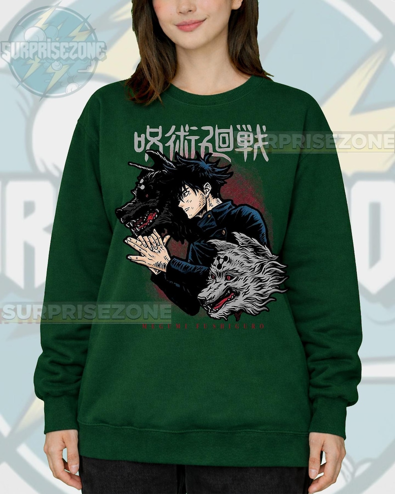 May include: Dark green sweatshirt featuring a graphic of an anime character with two wolf-like creatures. Japanese text is above the character. The sweatshirt has a crew neck and long sleeves. The brand name "SURPRISEZONE" is printed on the top.