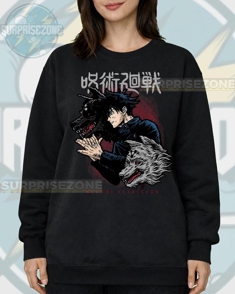 May include: Black sweatshirt featuring a graphic of an anime character with two wolf-like creatures. The design includes Japanese text and the name "Megumi Fushiguro". The sweatshirt has a crew neck and long sleeves.
