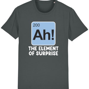 May include: Dark grey t-shirt with a blue and white graphic of a periodic table element. The element is labelled "Ah!" and "The Element of Surprise".
