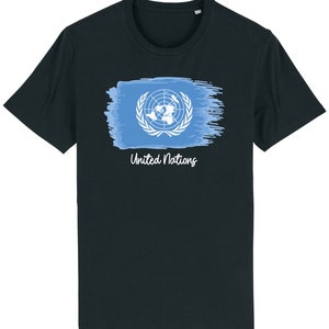 May include: A dark blue t-shirt featuring a blue and white United Nations flag graphic and the text "United Nations" in white.