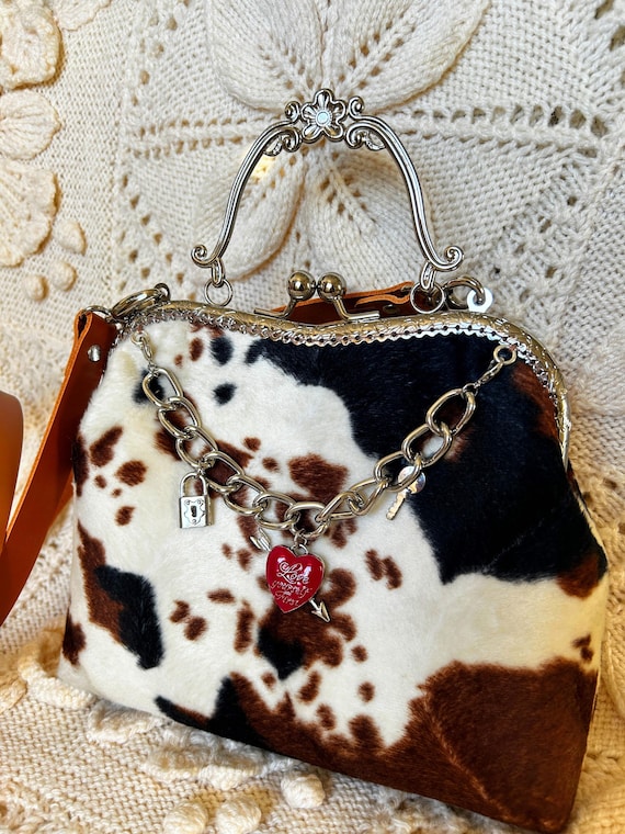 Faux Fur Cow Print Clutch Bag With Kiss Clasp Frame, Leather Strap