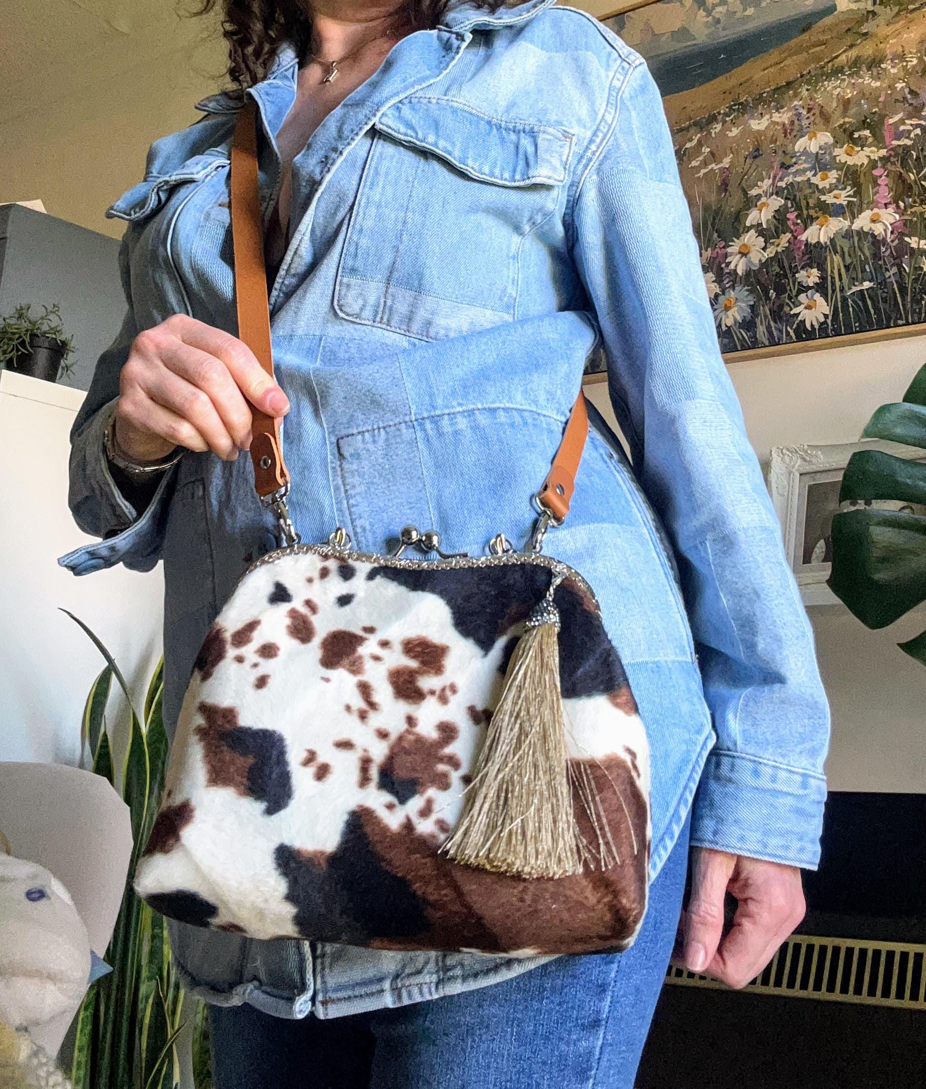 Faux Fur Cow Print Clutch Bag With Kiss Clasp Frame, Leather Strap