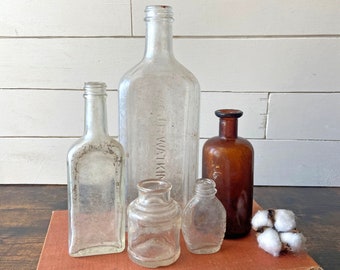 Clear And Amber Bottle Collection, 1870s - 1900s | Apothecary Bottles | Five Bottles | Farmhouse Decor, Rustic Bottles, Halloween Apothecary