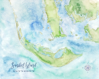 May include: A watercolor painting of Sanibel Island, Florida. The island is shown in shades of green and blue, with a compass rose in the lower right corner. The text "Sanibel Island" and the coordinates "26°26′32″N 82°06'09"W" are also included.