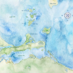 May include: A watercolor illustration of Lake Erie and the surrounding islands, including Pelee Island, Isle St. George, Middle Bass, South Bass, and Kelley's Island. The map also shows the towns of Lakeside Marblehead, Port Clinton, Danbury, and Bayview.