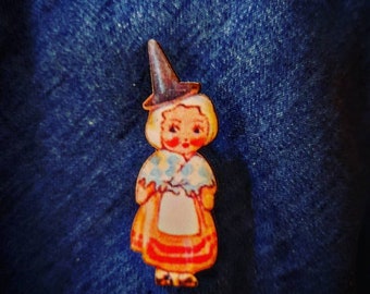 Brooch - One of my Welsh kewpie Lady wooden brooches