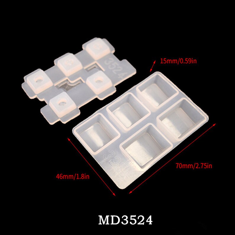 May include: A clear silicone mold with six square cavities, measuring 70mm by 46mm. The mold is designed for making small resin crafts. The mold is labeled "MD3524".