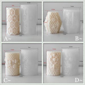May include: Four candle molds with detailed designs. One mold features bees and flowers, another a honeycomb pattern, a third with bees and flowers, and the last with tulips. The molds are approximately 3.5 to 4 inches tall.