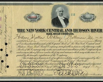 May include: A vintage stock certificate for one share of The New York Central and Hudson River Railroad Company, dated May 1, 1907, with the name Helen Muller Willey printed in cursive.