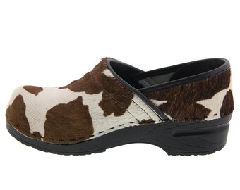 cow print dansko clogs