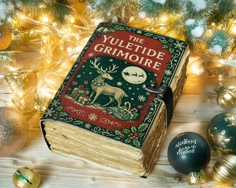 May include: A festive book titled "The Yuletide Grimoire" with a vintage design. The cover features a reindeer, gifts, and Santa's sleigh. The book is bound with a black strap and surrounded by Christmas ornaments and fairy lights.