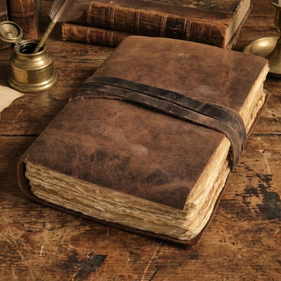481 hearts don't lie — a personalized extra-large leather grimoire/journal with rustic deckle-edge handmade paper is the kind of heirloom gift people cry over.