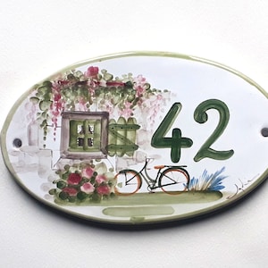 Personalized oval house sign for exterior of house