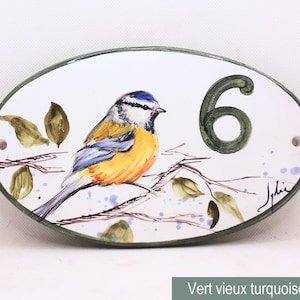 Oval house number plaque with bird design, customizable with number 6