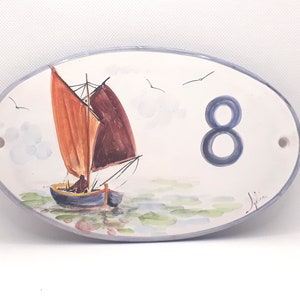 Oval street sign, sailboat decor on the sea, made and painted by hand