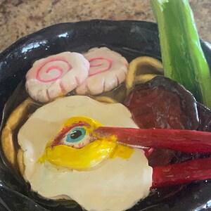 See-oyou-up Raman clay piece