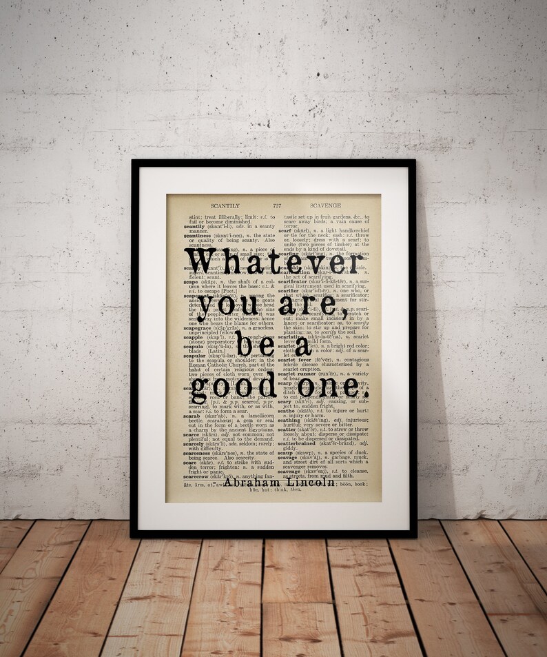 May include: A black and white image of a vintage dictionary page with the quote "Whatever you are, be a good one." attributed to Abraham Lincoln.
