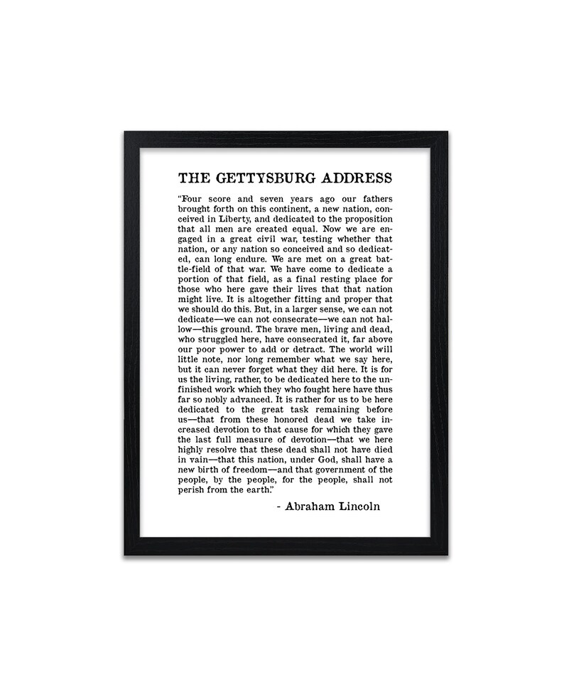 May include: Black and white text on a white background within a black frame. The text is the Gettysburg Address by Abraham Lincoln. The text is centred on the page and is in a traditional serif font.