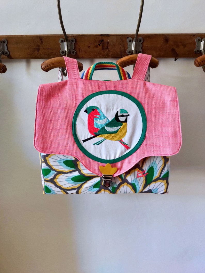 Primary schoolbag with embroidered birds