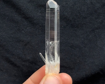 Super optical Pencil Quartz w/ a small Quartz point protruding from the bottom, from Colombia