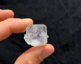 Beautiful clear Fluorite cube with purple phantom and tiny little Quartz rider from China