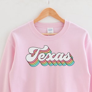 Texas Pastel Rainbow Crewneck Sweatshirt | Gildan 18000 Unisex Heavy Blend Crewneck Sweatshirt w/ Fleece Inside, custom state letters words