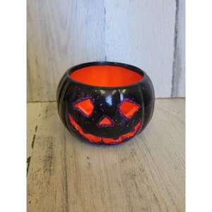 Figura de Halloween con soporte de purpurina para velas de té de calabaza negra