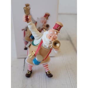 Hallmark Toymaker Santa ornament Xmas trumpet bell