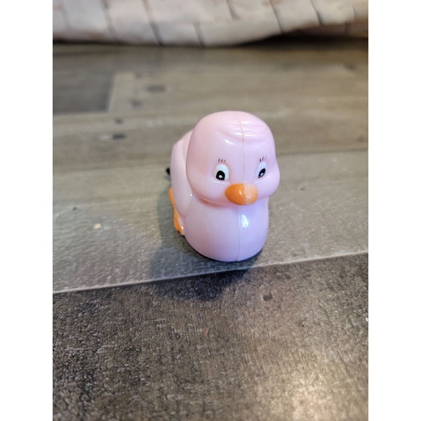 Pink duck wind up toy figure
