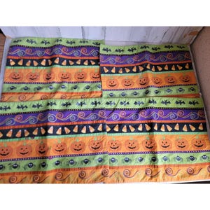 Halloween themed cloth placement candy corn pumpkin set