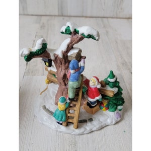 Ceramic kid Christmas tree birdhouse snow village accessory family