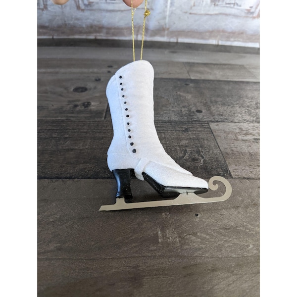 Ornement de patin à glace Patineur d'arbre de vacances de Noël