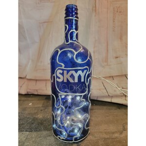 Large Blue Glass glitter lighted bottle home decor